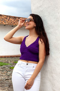 Beautiful young woman at the historical la merced church in the cali city downtown in colombia