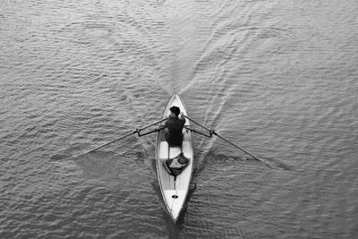 High angle view of man on boat sailing in river