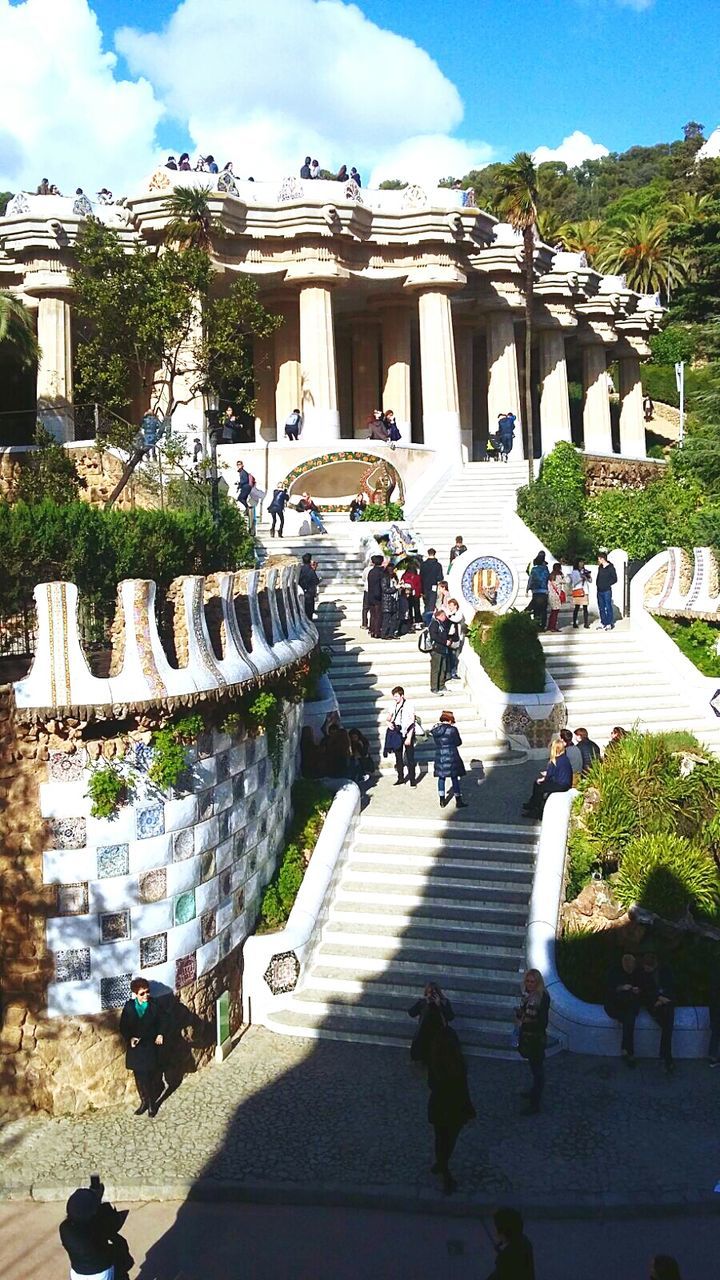 HIGH ANGLE VIEW OF PEOPLE IN TOWN SQUARE