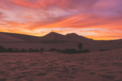 View of desert against scenic sky