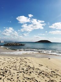 Scenic view of beach against sky