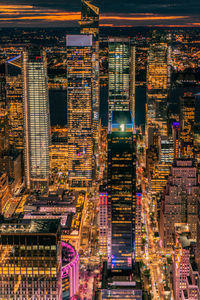 High angle view of illuminated buildings in city