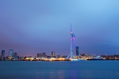 Illuminated buildings in city at night