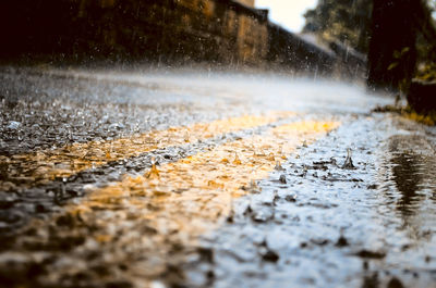 Surface level of road with rain drops