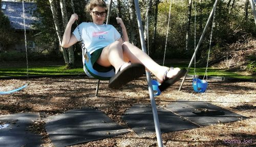 Woman jumping in park