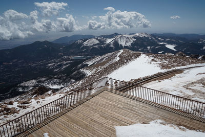 Observation point against snowcapped mountains