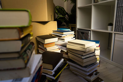 Stack of books in new loft apartment