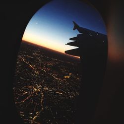 Aerial view of illuminated cityscape at night