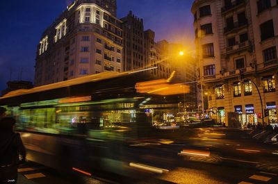 Blurred motion of cars on illuminated city at night