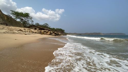 Scenic view of beach against sky