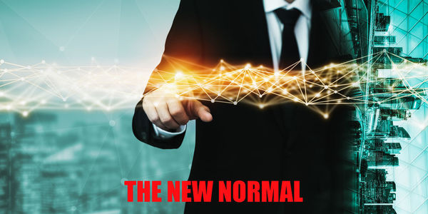 Digital composite image of man holding illuminated text