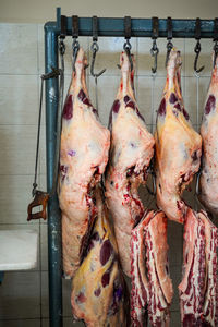 Close-up of meat hanging on display at store