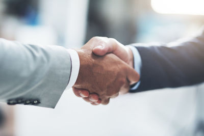 Cropped image of business colleagues shaking hands