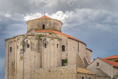 Low angle view of old building against sky