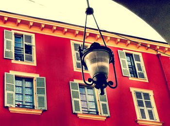 Low angle view of street light against sky