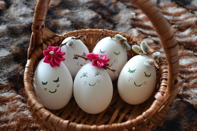 High angle view of eggs in basket on table