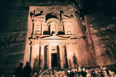 Group of people in front of historic building