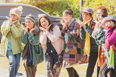 Group of people standing outdoors