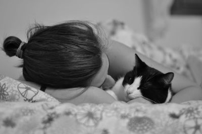 Close-up of cat lying down