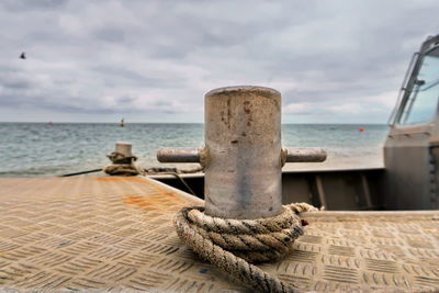 Close-up of rope against sea