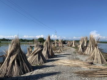 Panoramic shot of land against clear blue sky