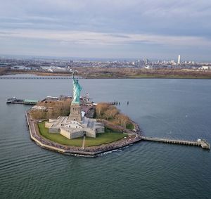 High angle view of city and state of liberty