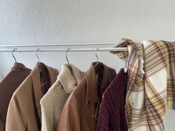 Clothes hanging on a rail, shop, sale, discounts