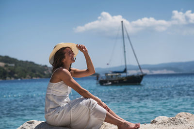 Woman sitting on beach