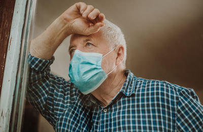 Portrait of man wearing mask