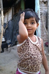 Portrait of cute girl standing outdoors