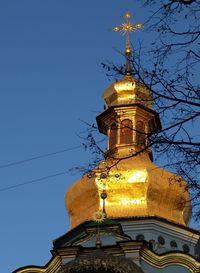 Low angle view of illuminated cathedral against clear blue sky