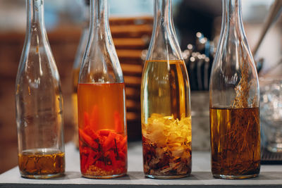 Close-up of drink in glass jar on table