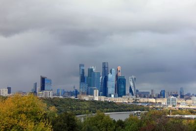 Modern buildings in city against sky