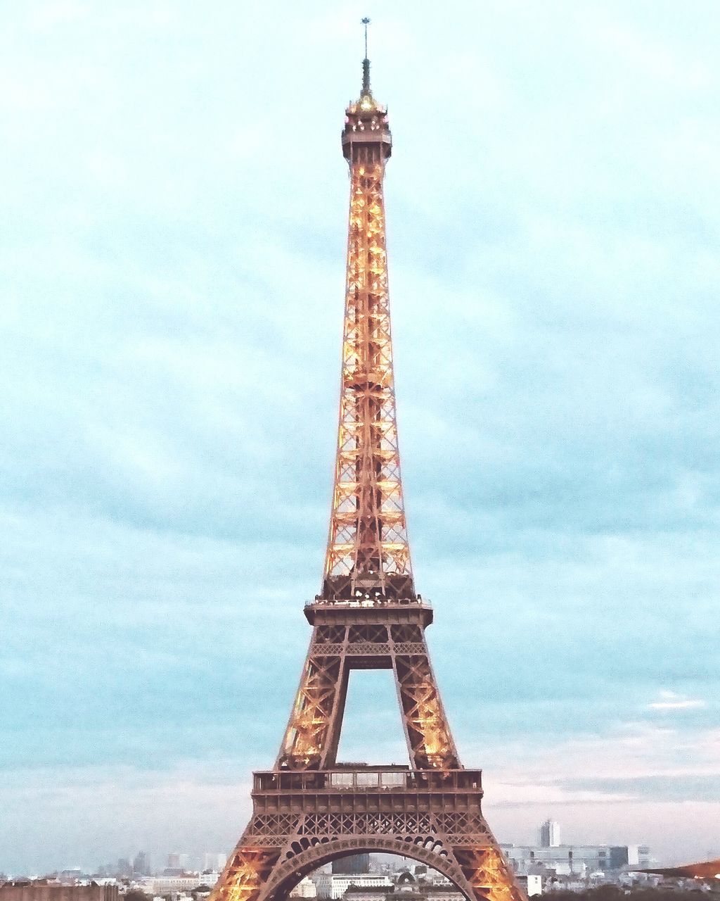 eiffel tower, international landmark, famous place, tourism, travel destinations, architecture, tower, built structure, travel, capital cities, tall - high, culture, sky, history, metal, building exterior, architectural feature, low angle view, city, day