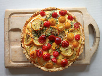 Overhead view of quiche served on table