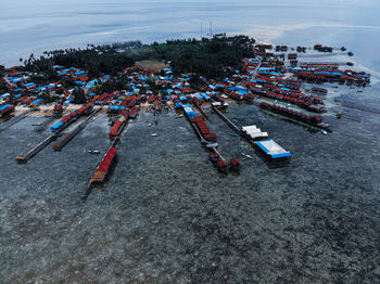 High angle view of container ship on sea