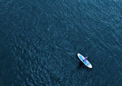 High angle view of boat sailing on sea