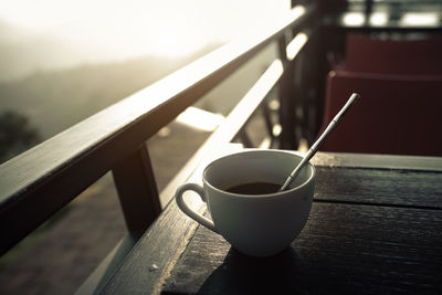 Close-up of coffee cup on table