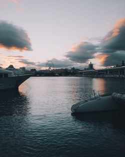 Scenic view of river against sky during sunset