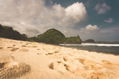 Scenic view of beach against sky