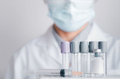 Midsection of person holding smart phone