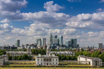 Buildings in city against sky