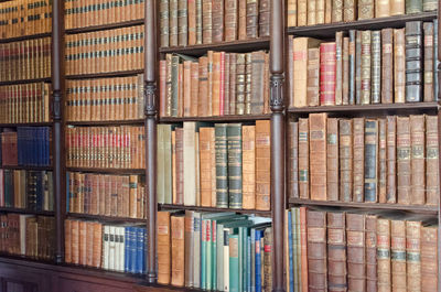 Books in shelves at library