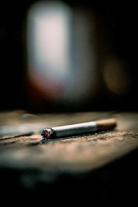 Close-up of cigarette on table
