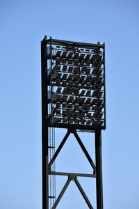 Low angle view of building against clear blue sky