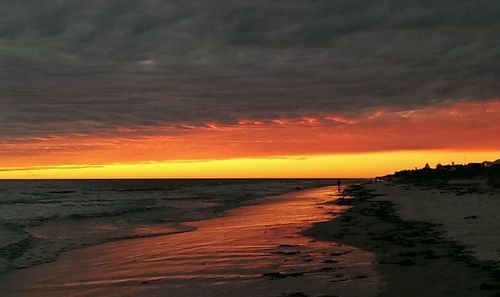 Scenic view of sea at sunset