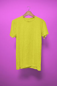 Clothes hanging on pink fabric