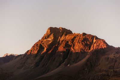 View of mountain range against clear sky