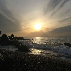 Scenic view of sea at sunset