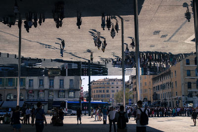 People walking on city street